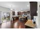 A spacious kitchen has granite countertops and an island with bar stool seating for casual dining at 320 Silverleaf Ln, Moncks Corner, SC 29461
