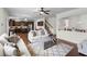 Bright, open-concept living space showcasing a seamless transition from the kitchen to the staircase at 320 Silverleaf Ln, Moncks Corner, SC 29461