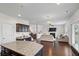 Open concept living space with a kitchen island that flows into the living room and dining area at 320 Silverleaf Ln, Moncks Corner, SC 29461