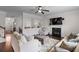 Cozy living room with fireplace and large TV, furnished with comfortable seating at 320 Silverleaf Ln, Moncks Corner, SC 29461