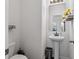 Clean powder room with pedestal sink, stylish fixtures, and neutral decor at 320 Silverleaf Ln, Moncks Corner, SC 29461
