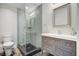 Modern bathroom with a glass shower, vanity, and neutral color scheme at 322 Lantana Dr, Charleston, SC 29407