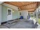 Attached carport featuring wooden beams, an adjacent storage area, and a convenient ramp at 322 Lantana Dr, Charleston, SC 29407