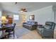 Comfortable living room with a ceiling fan, desk, and leather furniture at 322 Lantana Dr, Charleston, SC 29407