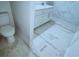 Bathroom featuring a white toilet, white vanity, and a modern shower featuring mosaic-patterned tile at 3292 N Highway 52, Saint Stephen, SC 29479