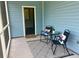 Inviting screened-in porch with comfortable seating and a patterned rug, perfect for relaxing and enjoying the outdoors at 3292 N Highway 52, Saint Stephen, SC 29479