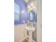 Stylish half bathroom features a pedestal sink, and decorative accents for a contemporary look at 353 Dunlin Dr, Summerville, SC 29486