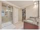 Well-appointed bathroom with granite counters, double sinks, tiled shower, and walk-in closet at 353 Dunlin Dr, Summerville, SC 29486