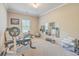 Spacious exercise room featuring workout equipment, mirrors, and natural light from the window at 353 Dunlin Dr, Summerville, SC 29486