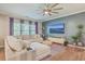Inviting living room featuring a cozy sectional, modern furnishings, and a wall-mounted television for entertainment at 353 Dunlin Dr, Summerville, SC 29486