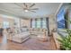 Open-concept living room showcasing a comfortable sectional sofa, modern decor, and ample natural light at 353 Dunlin Dr, Summerville, SC 29486