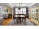 Elegant dining room featuring a large window and a decorative chandelier at 3558 Stockton Dr, Mount Pleasant, SC 29466