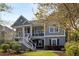 Charming two-story home featuring a covered front porch and a landscaped front yard at 3558 Stockton Dr, Mount Pleasant, SC 29466