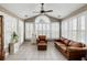 Bright sunroom with large windows, tile flooring, and comfortable seating at 3558 Stockton Dr, Mount Pleasant, SC 29466