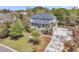 Expansive aerial view of the home with a long driveway, mature trees and landscaped lawn at 3734 St Ellens Dr, Mount Pleasant, SC 29466