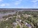 Aerial view of homes nestled among the trees by the waterfront at 3734 St Ellens Dr, Mount Pleasant, SC 29466