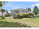 Spacious backyard featuring a screened-in porch, lush green grass, and mature trees creating a private oasis at 3734 St Ellens Dr, Mount Pleasant, SC 29466
