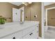 Well-lit bathroom showcasing white cabinets, modern fixtures, and a spacious layout with a clean design at 3734 St Ellens Dr, Mount Pleasant, SC 29466