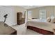 Comfortable bedroom with a wooden wardrobe, soft carpet, and natural light streaming through the windows at 3734 St Ellens Dr, Mount Pleasant, SC 29466