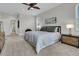 Bright bedroom featuring plush carpeting, ceiling fan and a comfortable bed with matching nightstands and artwork at 3734 St Ellens Dr, Mount Pleasant, SC 29466