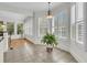 Bright breakfast nook with tiled floor, plantation shutters, and natural light at 3734 St Ellens Dr, Mount Pleasant, SC 29466