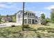 Charming two-story home featuring a screened-in porch, spacious garage, and a well-manicured lawn at 3734 St Ellens Dr, Mount Pleasant, SC 29466