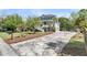 Charming two-story home with light blue exterior, white trim, and a spacious front yard with an elegant driveway at 3734 St Ellens Dr, Mount Pleasant, SC 29466