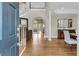 Grand foyer with high ceilings, hardwood floors, and elegant staircase, leading to a spacious living area at 3734 St Ellens Dr, Mount Pleasant, SC 29466