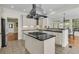 Gourmet kitchen features custom cabinetry, stainless steel appliances, granite countertops, and a center island at 3734 St Ellens Dr, Mount Pleasant, SC 29466