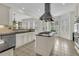 Open kitchen featuring a center island cooktop, stainless steel appliances, and bright window views at 3734 St Ellens Dr, Mount Pleasant, SC 29466