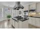 Well-appointed kitchen with a center island cooktop, stainless steel appliances, and sunny breakfast nook at 3734 St Ellens Dr, Mount Pleasant, SC 29466