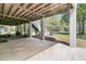 View of the home's foundation, featuring support beams, stairs, and landscaping in a well-maintained yard at 3734 St Ellens Dr, Mount Pleasant, SC 29466