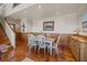 Charming dining room with a wooden table, six chairs, and wood trim, creating a cozy space for dining at 377 Lofton Ct, McClellanville, SC 29458