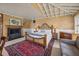 Inviting bedroom featuring a cozy fireplace and natural textures, providing a warm and tranquil retreat at 377 Lofton Ct, McClellanville, SC 29458