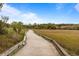 Wooden walkway over the marsh that leads to the beautiful waterfront property at 377 Lofton Ct, McClellanville, SC 29458