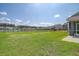 Large backyard overlooking a lake, playground, and other homes in the community at 400 Dunlin Dr, Summerville, SC 29486