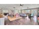 Elegant clubhouse interior with ample seating, hardwood floors and large windows providing natural light at 400 Dunlin Dr, Summerville, SC 29486