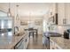 The kitchen showcases granite countertops, stainless steel appliances, and wood flooring at 400 Dunlin Dr, Summerville, SC 29486