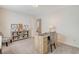 Home office featuring carpeting, desk, chair, and shelving for books and decor at 400 Dunlin Dr, Summerville, SC 29486