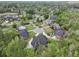 High aerial view showcasing well-spaced homes nestled within a serene, tree-lined residential area at 4204 Magnolia Ct, North Charleston, SC 29420