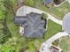 Aerial image of a house with well-designed outdoor living space, complete with a spacious deck and lush landscaping at 4204 Magnolia Ct, North Charleston, SC 29420
