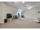 Versatile basement with a large carpeted area, ideal for entertainment and exercise at 4204 Magnolia Ct, North Charleston, SC 29420