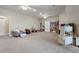 Expansive basement with built-in shelving and ample space for recreational activities at 4204 Magnolia Ct, North Charleston, SC 29420