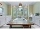Bright primary bathroom features a large tub, vanity, and makeup mirror on the counter at 4204 Magnolia Ct, North Charleston, SC 29420