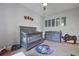 Charming Bedroom with gray furniture set, space-themed decor, and neutral walls at 4204 Magnolia Ct, North Charleston, SC 29420