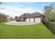 Beautiful brick home with an attached three-car garage and well-manicured lawn at 4204 Magnolia Ct, North Charleston, SC 29420