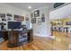 Spacious home office featuring hardwood floors, recessed lighting, and decorative trim at 4204 Magnolia Ct, North Charleston, SC 29420