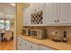 Kitchen with granite countertops, wine rack, and modern appliances at 4204 Magnolia Ct, North Charleston, SC 29420