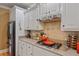 Kitchen features stainless steel appliances, granite countertops, tile backsplash, and ample storage space at 4204 Magnolia Ct, North Charleston, SC 29420