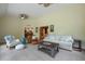 Spacious living room with ample seating, lots of natural light, and open layout at 4204 Magnolia Ct, North Charleston, SC 29420